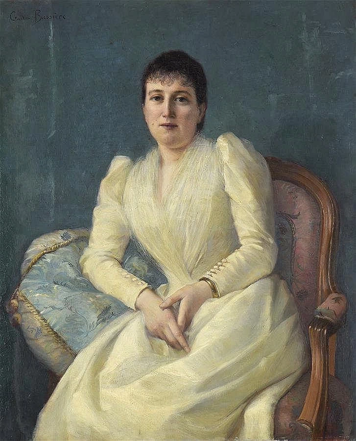 Giovane donna seduta in poltrona